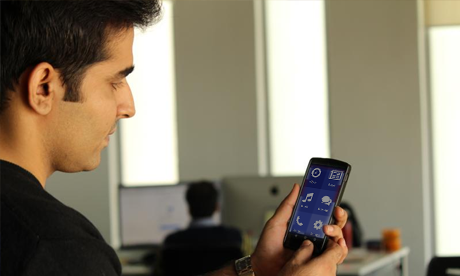 A man using a Shravan smartphone